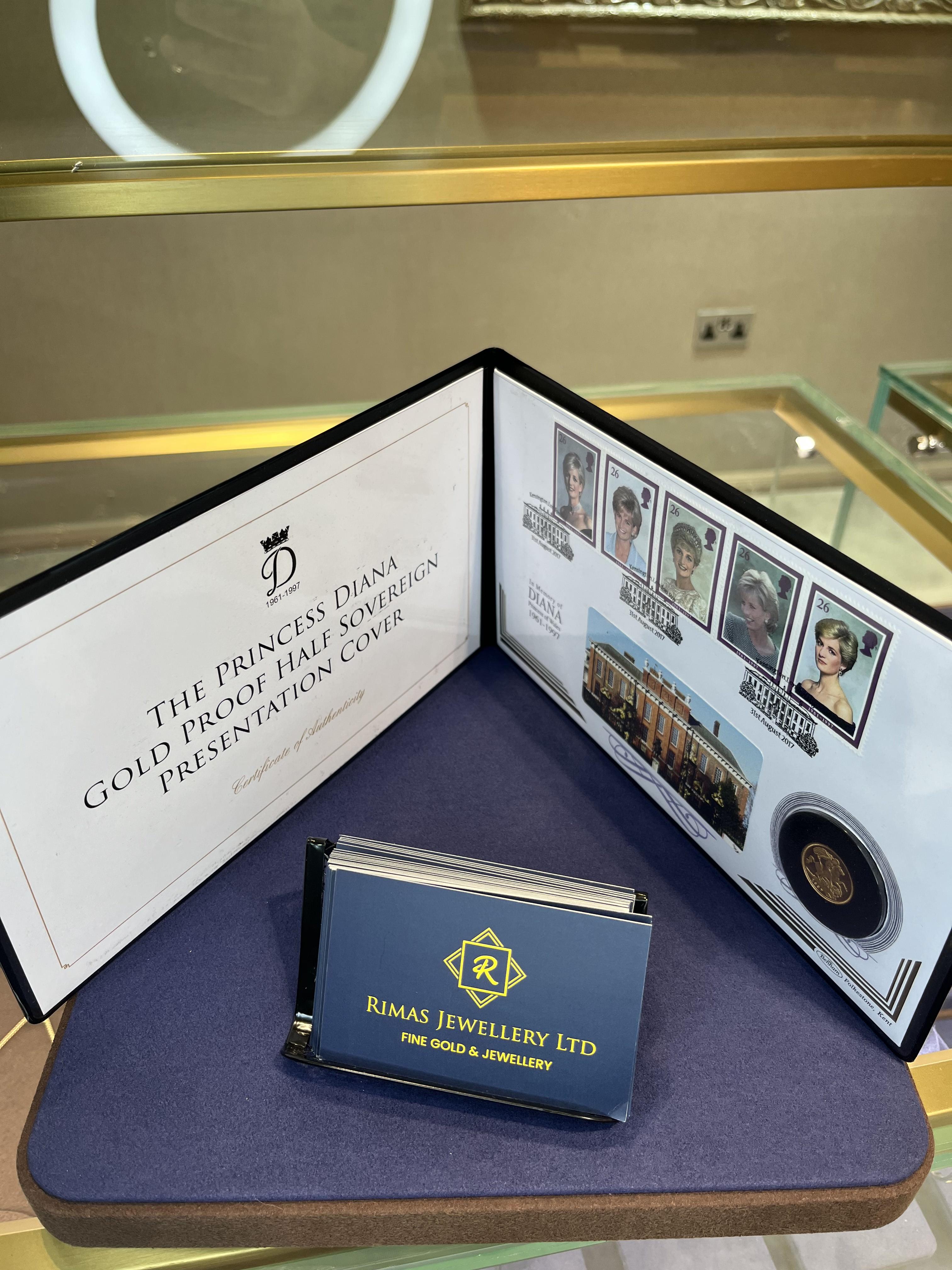 The Princess Diana gold proof half sovereign presentation cover, open beside its certificate of authenticity.